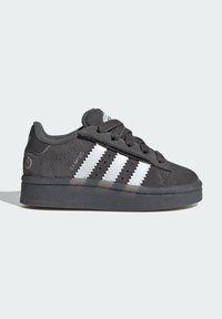 Black Adidas Campus sneaker with white three stripes, lace-up closure, suede upper, and rubber sole shown from the side.