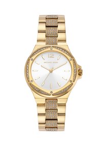 Zelta tonis pulksteņi ar apaļu seju, baltu ciparnīcu, zelta atzīmēm un gredzenu, kas ietverts ar kristāliem. Savienojuma rokassprādze ar teksturētiem akcentiem.