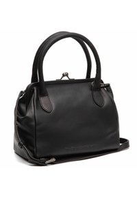 Mustakoruinen käsilaukku, jossa on pyöristetty yläosa, kaksi kahvaa ja säädettävä olkahihna. Varustettu lukitusmekanismilla ja hienovaraisella kohokuvioidulla brändäyksellä.