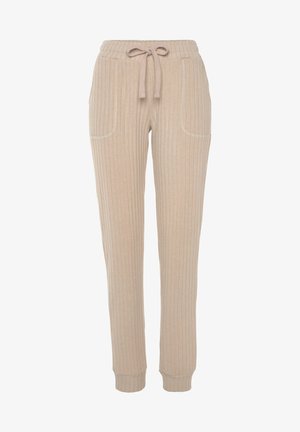 Beige, gerippte Jogginghose mit elastischem Bund, Kordelzug und zwei Seitentaschen. Weicher Stoff, schmal zulaufend am Knöchel.
