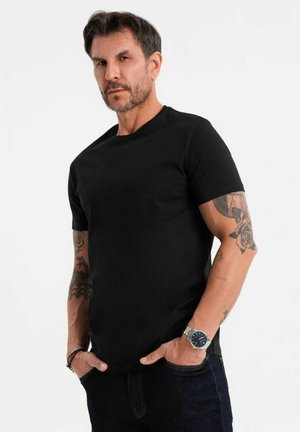 Schwarz, kurzärmliges T-Shirt in klassischem Schnitt, aus glattem Baumwollstoff gefertigt, mit Rundhalsausschnitt und ohne sichtbare Muster oder Akzente.