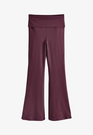 Kõrge vöökohaga laiade säärega püksid sügavbordoopunasest, volditud vöökohaga, valmistatud siledast, venivast kangast.