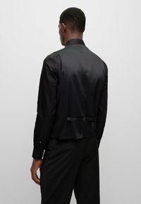 BOSS JASPER - Gilet elegante - black one