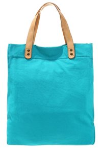 Tygpåse i ljus turkos med två ljusbruna läderhandtag och sömnadsdetaljer. Rektangulär form, robust tyg.