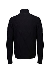 Maglione nero a maglia con colletto alto e un motivo a diamante testurizzato su tutta la superficie. Maniche lunghe con polsini e bordo a coste.