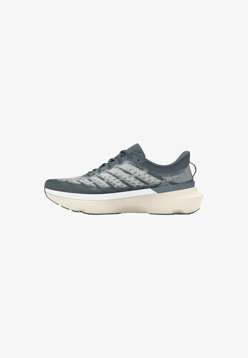 Baskets de sport gris foncé avec une tige en maille texturée, des accents gris clair, une semelle rembourrée et un design minimaliste, dotées d'une semelle intermédiaire blanche.