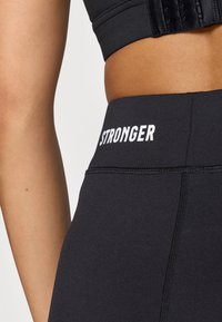 Stronger HERO LEGGINGS - Tajice - black