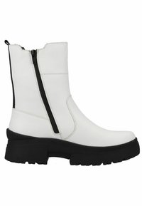 White leather ankle boot with a chunky black sole, featuring a side zipper and contrasting black accents. Smooth texture, minimalistic design.