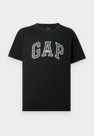 Zwarte katoenen T-shirt met korte mouwen, ronde halslijn en prominent wit "GAP" logo met "Athletic" detail in contrasterend lettertype.