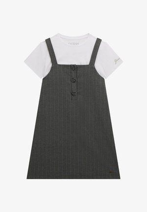 Gray pinstriped dress with straps, featuring three black buttons down the front and a white t-shirt underneath. Subtle logo detail on sleeve.