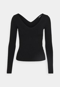 Maglietta nera a maniche lunghe con scollatura a V profonda e silhouette aderente, realizzata in un tessuto testurizzato per comfort e stile.