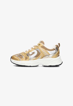 Gold and silver athletic sneakers with mesh panels, white laces, a thick white sole, and textured accents on the sides and heels.