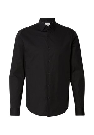 Μαύρο πουκάμισο με μακριά μανίκια και κουμπιά, κατασκευασμένο από απαλό ύφασμα. Διαθέτει κανονικό γιακά και εμπρόσθιο καπάκι με μαύρα κουμπιά. Φαρδιά εφαρμογή.