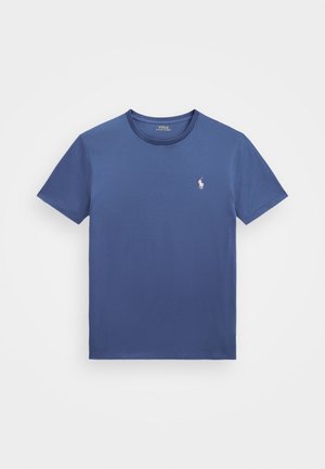 T-shirt in cotone blu a maniche corte con scollo tondeggiante e piccolo logo bianco Polo Ralph Lauren con cavallo sul petto sinistro.