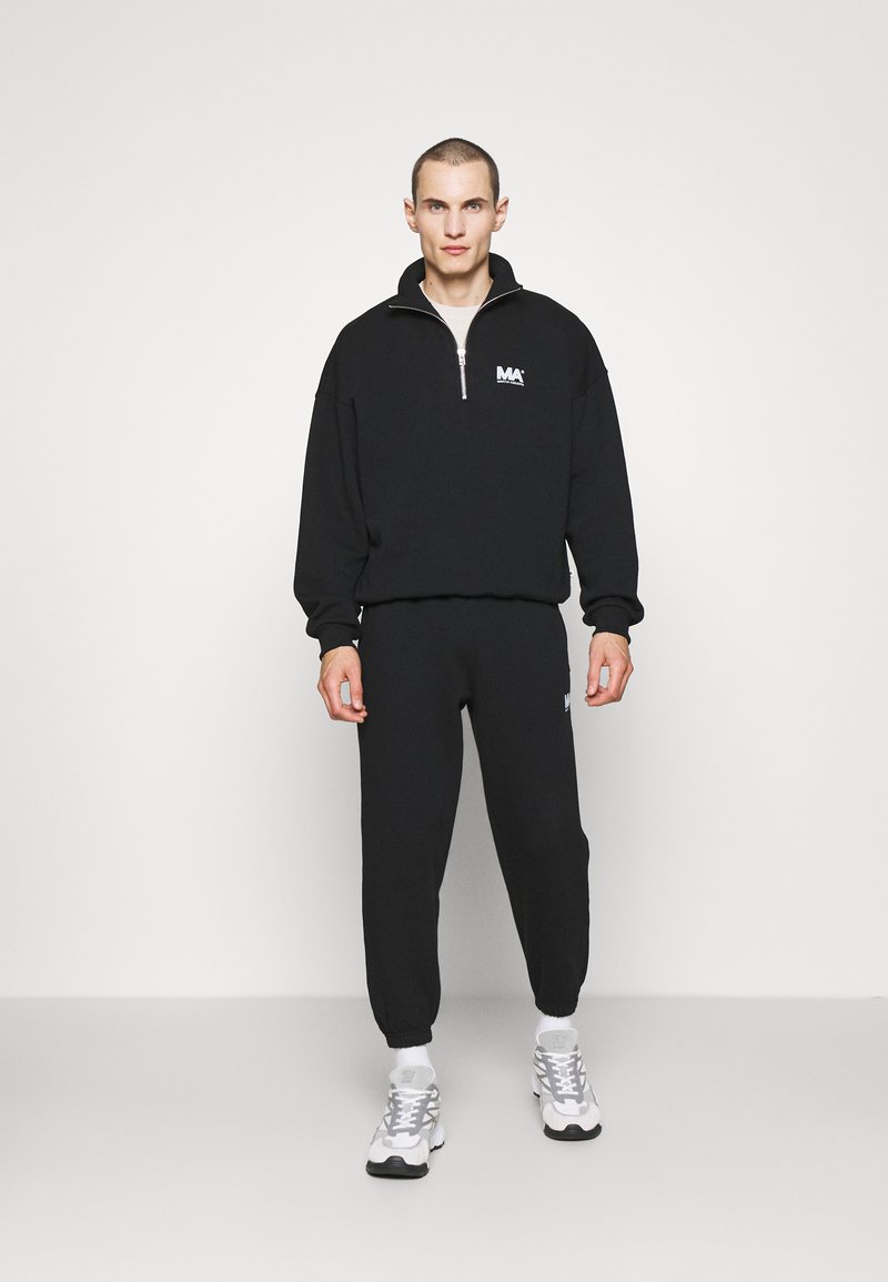 Herren T-shirts & Polos | Martin Asbjørn Sweatshirt black/schwarz - UJ83479 Herren T-shirts & Polos | Martin Asbjørn Sweatshirt black/schwarz - UJ83479