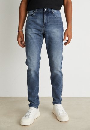 Calvin Klein Jeans SLIM TAPER - Jeans fuselé - denim dark