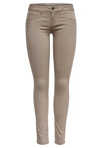 Jeans skinny beige con una textura suave, que cuentan con un cierre frontal de botón, pasadores para cinturón y un diseño de cinco bolsillos.