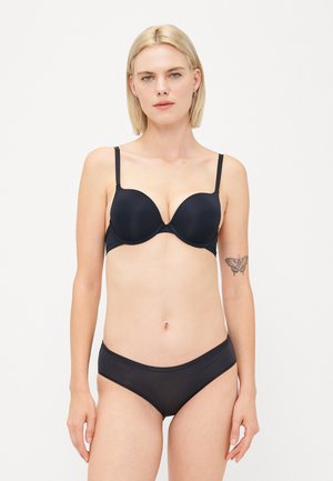 Black underwire bra with smooth cups, adjustable straps, and matching black bikini briefs. Made of stretchy fabric for comfort.