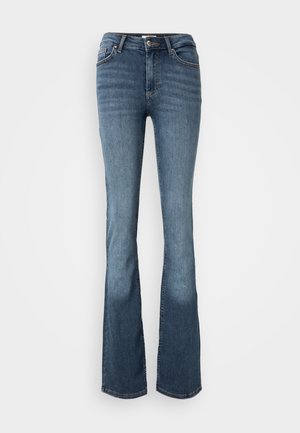 Bootcut jeans laget av blå denim. Har middels høy midje, fem lommer, subtil søm og en lett falmet look på bena.