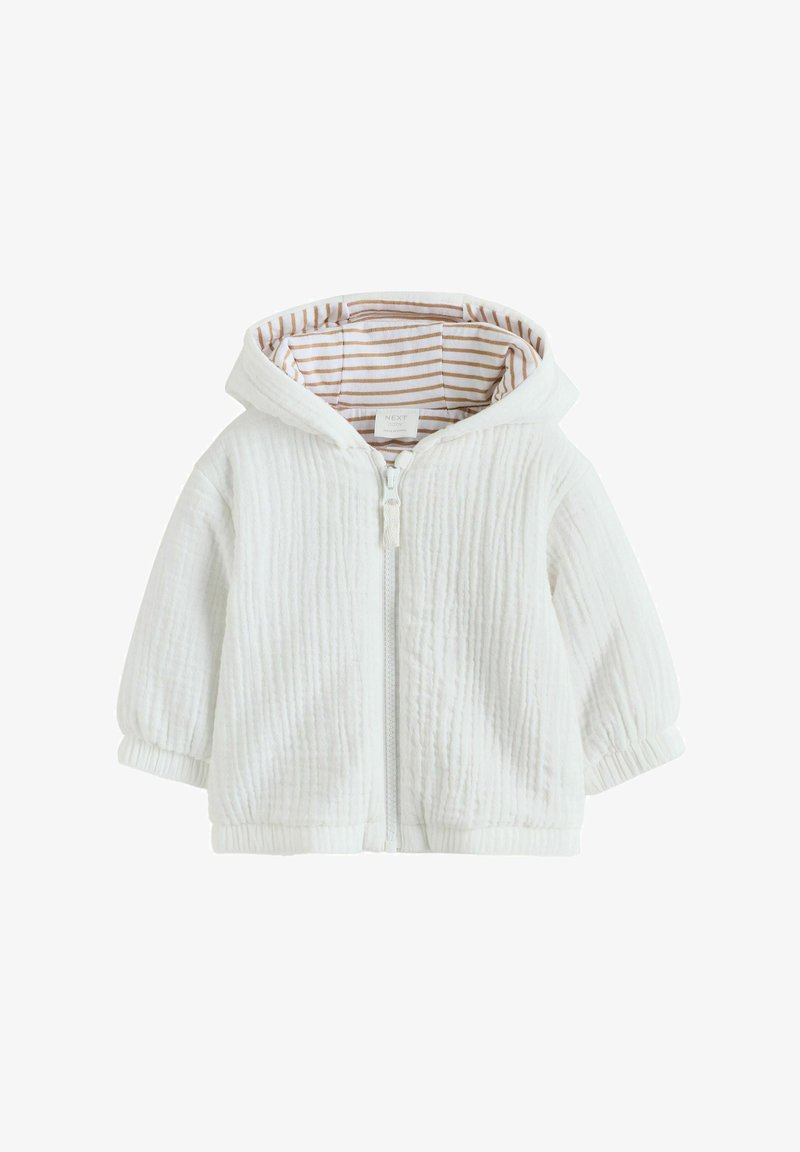 Weißer Kapuzenpullover mit Reißverschluss, gefertigt aus einem strukturierten Stoff mit braun-weiß gestreiftem Futter. Verfügt über eine Kapuze und elastische Bündchen.