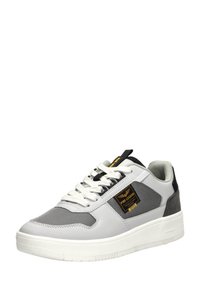 Gray sneaker with white sole, mesh and smooth leather upper, black accents, and a gold logo patch. Features white laces and padded collar.