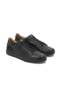 Sneaker in pelle nera con una texture liscia, punta tonda, design con lacci e suola in gomma. Include dettagli cuciti e sottili accenti dorati.