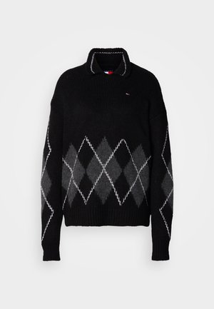 Sort strikket sweater med krave og argyle-mønster i nuancer af grå og hvid. Ribstrikkede ærmegab og taljebånd. Logodetalje på brystet.