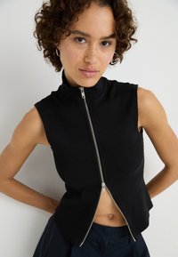 Weekday HIGH NECK ZIP VEST - Bodywarmer - black