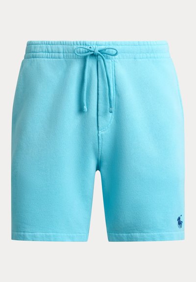 Shorts en tricot bleu clair avec taille élastique et cordon de serrage, présentant un petit logo brodé d'un joueur de polo bleu foncé sur la jambe gauche.