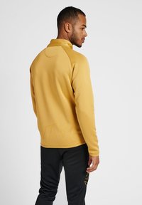 Hummel JACKET - Trainingsjacke - antique gold