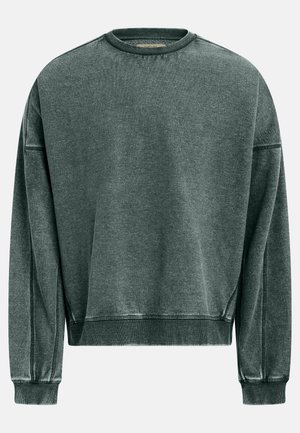 Veľká mikina s okrúhlym výstrihom v tmavozelenej farbe, vybavená rebrovanými manžetami a lemom, textúrovanou látkou a prešitím pozdĺž švov.