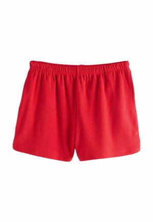 Pantaloni scurți roșii din fleece cu talie elastică și buzunare laterale, așezați pe o suprafață albă.