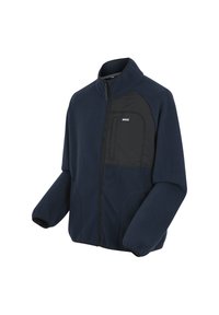 Veste en polaire bleu marine avec fermeture éclair complète à l'avant et poche poitrine noire ornée d'un petit patch logo, manches longues et col montant.