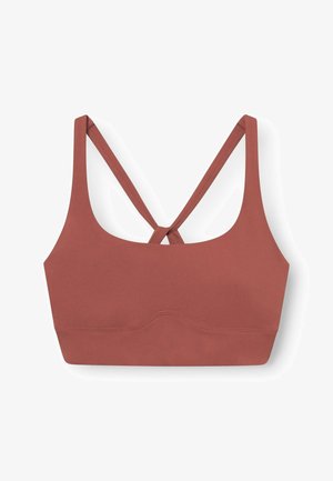 Sutien sport în culoare roz profund, fabricat dintr-un material neted și elastic. Prezintă un design racerback cu bretele încrucișate și detalii cusute.