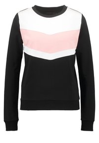 Svart sweatshirt med ett chevron-mönster i rosa och vitt. Långa ärmar, rund halsringning och ribbade muddar och nederkant.