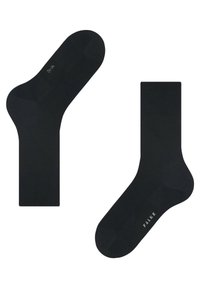 Schwarze Baumwollsocken mit einem gerippten Bündchen, verstärktem Absatz und glatter Textur, mit dem Markennamen "FALKE" auf der Sohle gedruckt.