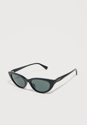 Black cat-eye sunglasses with dark lenses and gold "RALPH" branding on the temple, shown from a side angle on a white background.