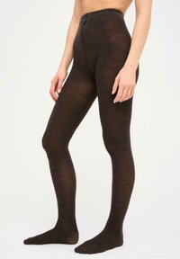 Bruna texturerade strumpbyxor med hög midja, med ett ribbat mönster och slät ytfinish. Designade för en åtsittande passform från midjan till vristerna.