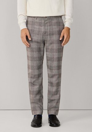 Grau- und braun-karierte Hose aus strukturiertem Stoff mit geradem Schnitt, Fronttaschen und Knopfverschluss.