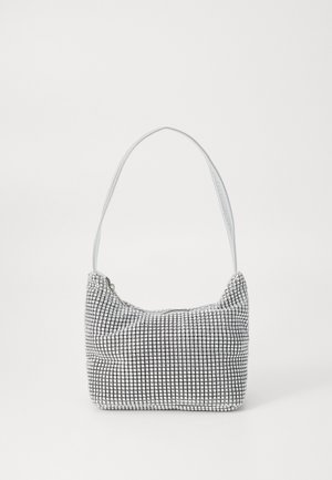 Small black and white checkered handbag with a soft texture, zip closure at the top, and a thin shoulder strap.