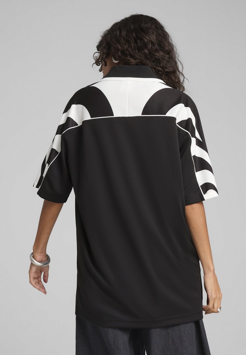 Puma - FUTURE ARCHIVE RELAXED   - Polo shirt - puma black, Enlarge