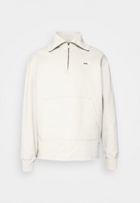 Světle šedá mikina s půlkruhovým zipem u krku, střední kapsou na přední straně a jemným výšivkou "www." na hrudi. Hladký bavlněný materiál.