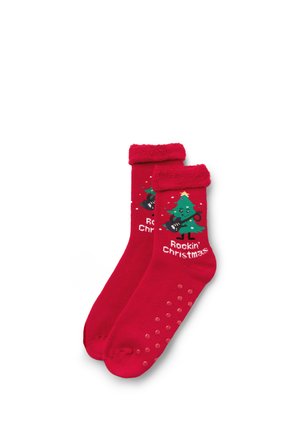 Červené vánoční ponožky s vánočním stromečkem, který zpívá a hraje na kytaru, s nápisem "Rockin' Christmas" a protiskluzovými úchyty na podrážkách.