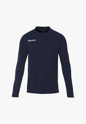 Marineblå langærmet T-shirt lavet af fugttransporterende materiale, med rund halsudskæring og "Kempa" logoet på forsiden. Enkel design.