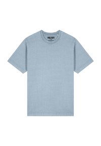 T-shirt bleu clair à manches courtes en coton avec un col rond. Présente une étiquette imprimée "MIRA PARIS" à l'intérieur du col.