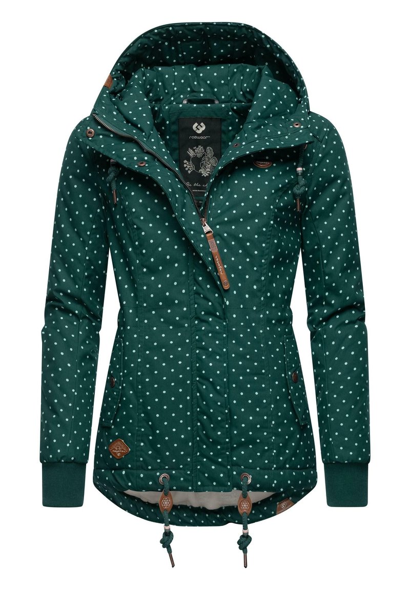 Chaqueta verde con lunares blancos, cierre frontal con cremallera, puños elásticos, capucha ajustable y cordones en el dobladillo. Presenta detalles de cuero.