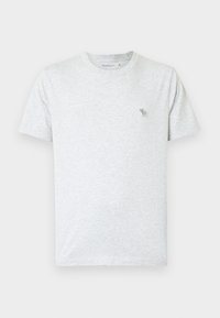 Lys grå t-shirt lavet af blød bomuld, med rund hals og korte ærmer. Lille grønt dyrelogo på den øverste venstre bryst.
