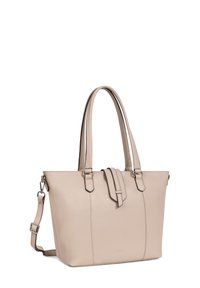 Beżowa torba na ramię o usztywnionym kształcie, gładkiej skórzanej fakturze, dwóch długich rączkach oraz odpinanym pasku na ramię. Posiada centralne zapięcie.