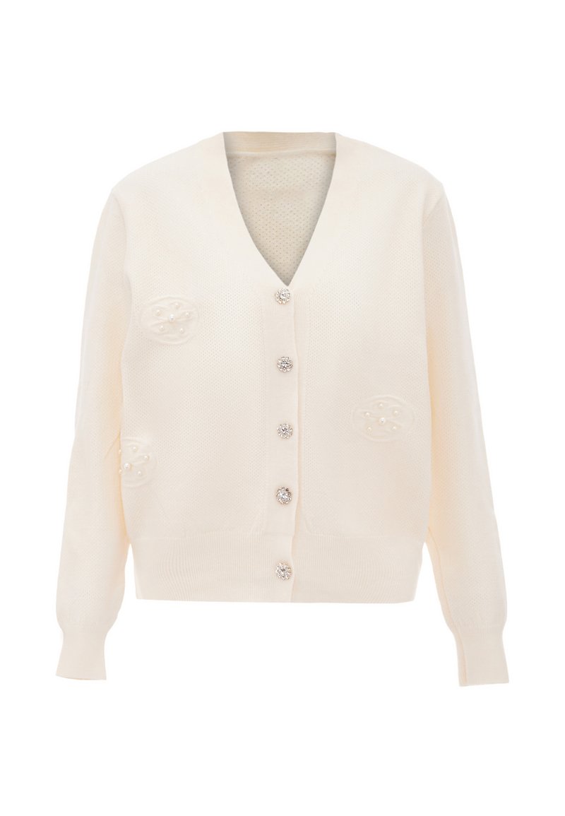 Cardigan a maglia crema con scollatura a V, caratterizzato da bottoni simili a perle e dettagli testurizzati sul petto. Fit morbido e rilassato con bordi a coste.