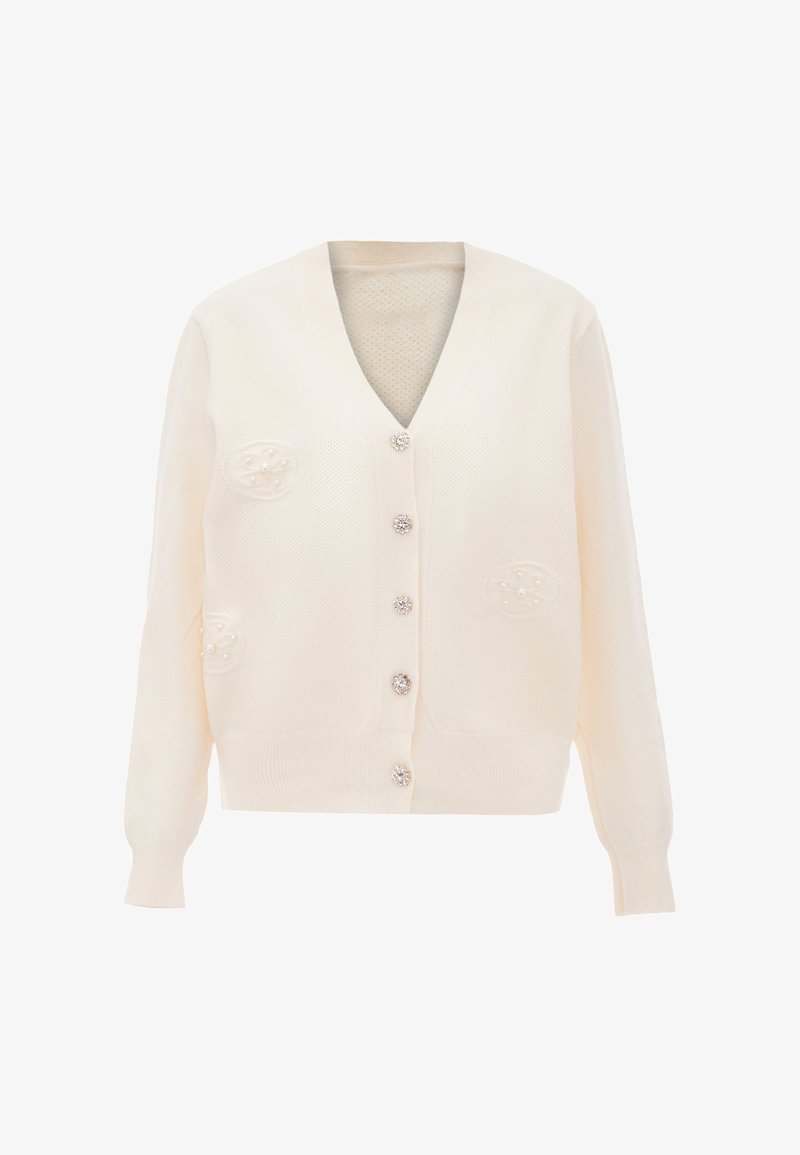 Krém színű kötött kardigán V-nyakkal, gyöngyszerű gombokkal és texturált részletekkel a mellrészen. Lágy, lezser fazon, bordázott mandzsettákkal.